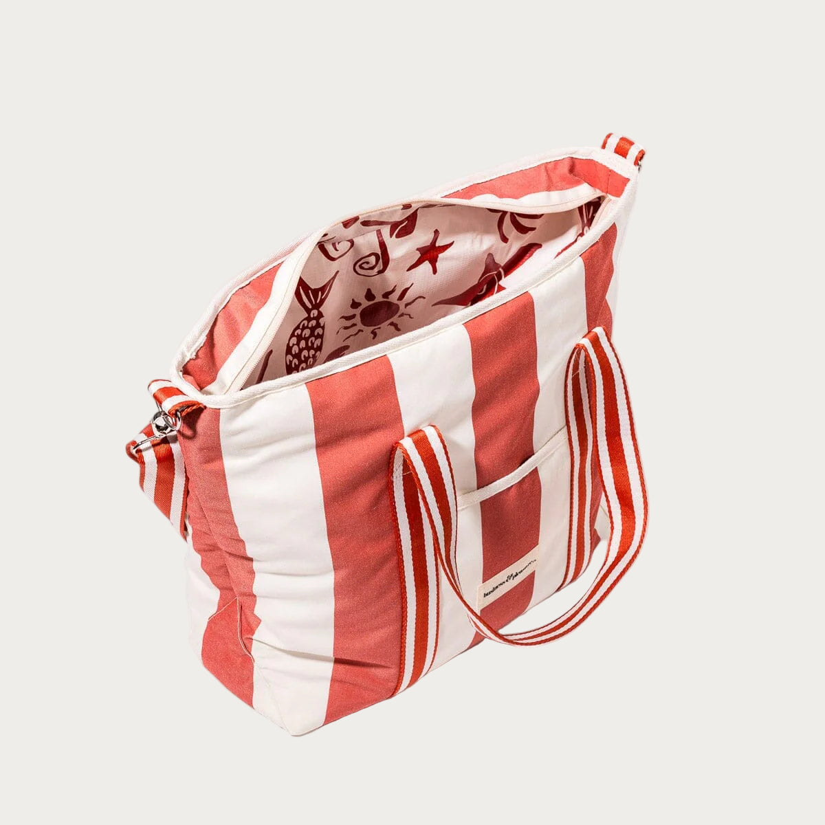 Red and white striped tote bag on a white background