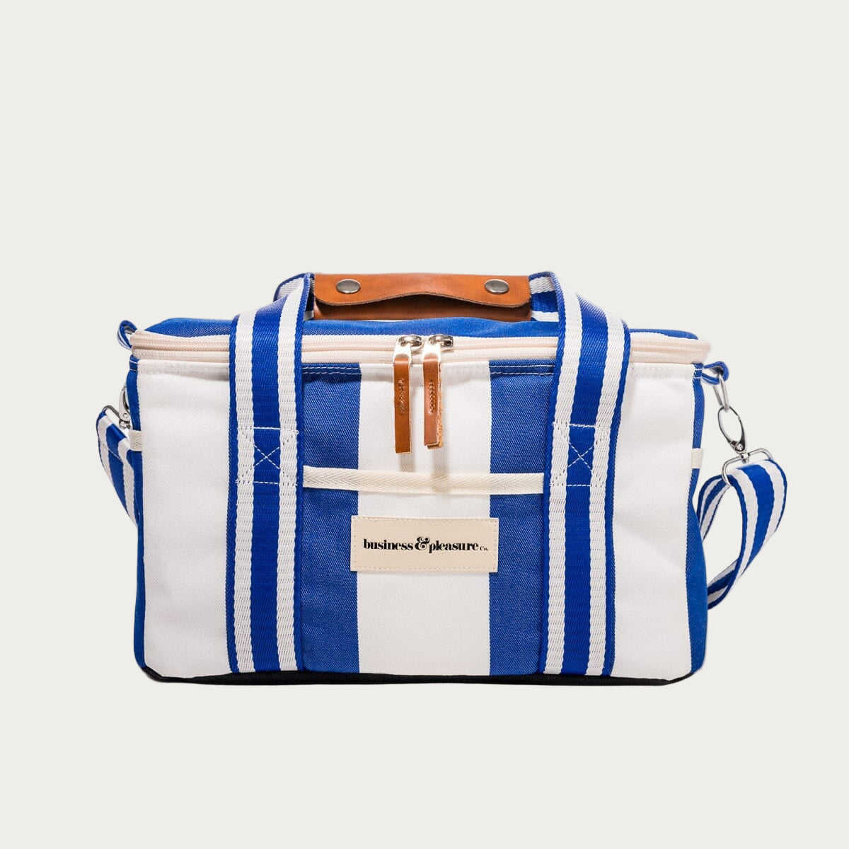 Blue and white striped bag with a visible brand label on a white background
